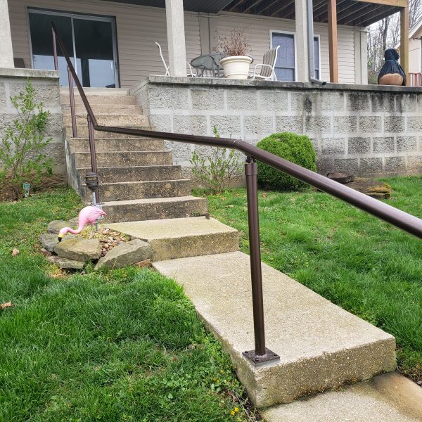 Copper Vein Handrail, round posts, and cradle brackets